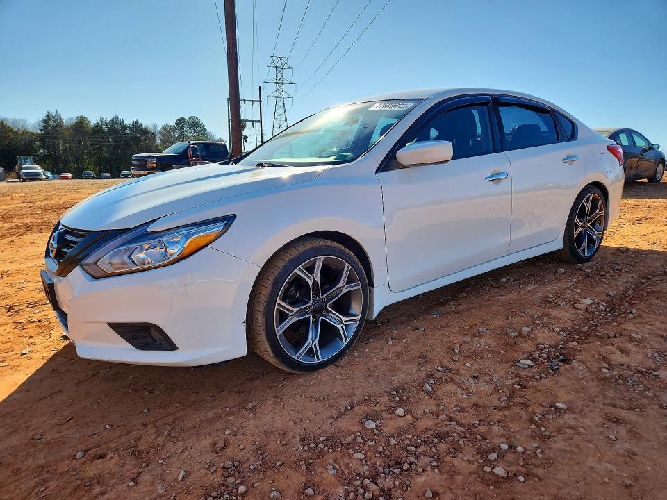 NISSAN ALTIMA 2017 with VIN 1N4AL3AP7HC495256 - Photo from auction