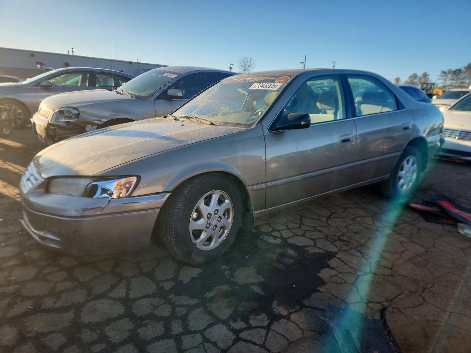 TOYOTA CAMRY 1999 with VIN JT2BF22K8X0153679 - Photo from auction