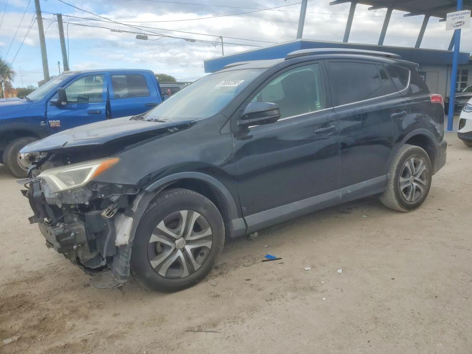 TOYOTA RAV4 LE 2018 with VIN 2T3ZFREV6JW417957 - Photo from auction
