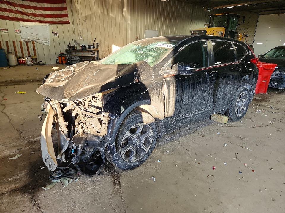 Photo 1 from auction – 2018 HONDA CR-V with VIN 7FARW1H51JE019210