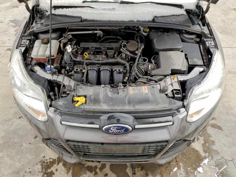 Photo 11 from auction – 2014 FORD FOCUS SE with VIN 1FADP3F26EL281577