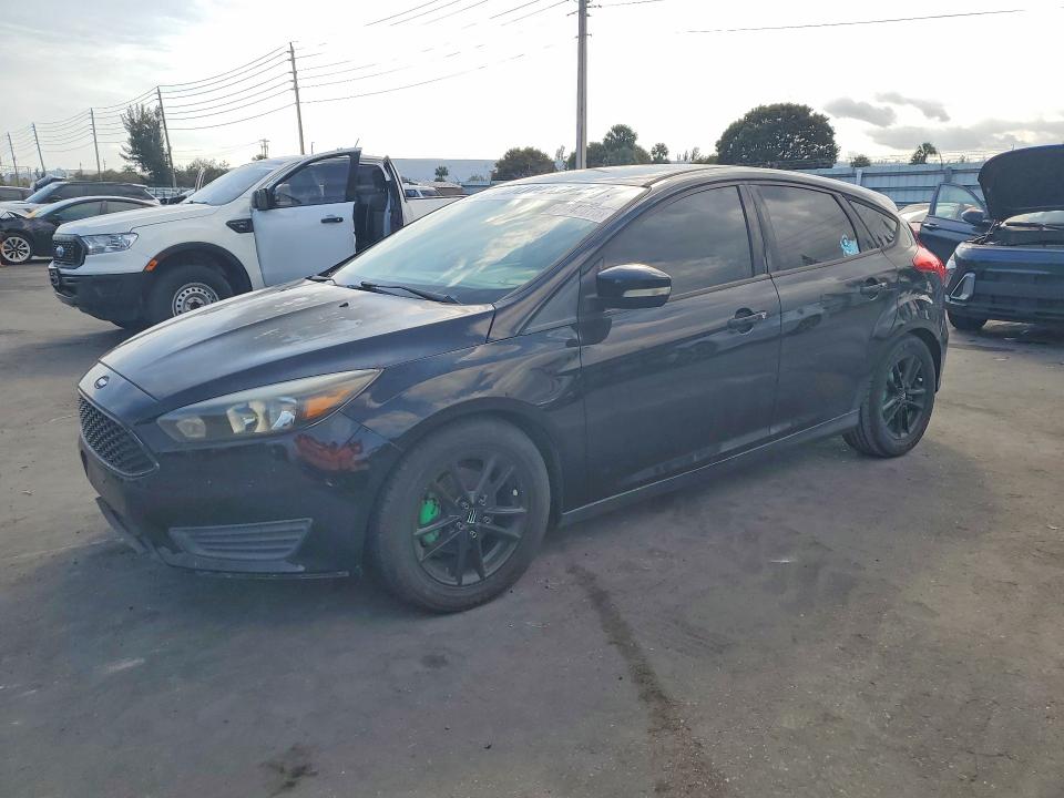 FORD FOCUS 2016 with VIN 1FADP3K2XGL393601 - Photo from auction