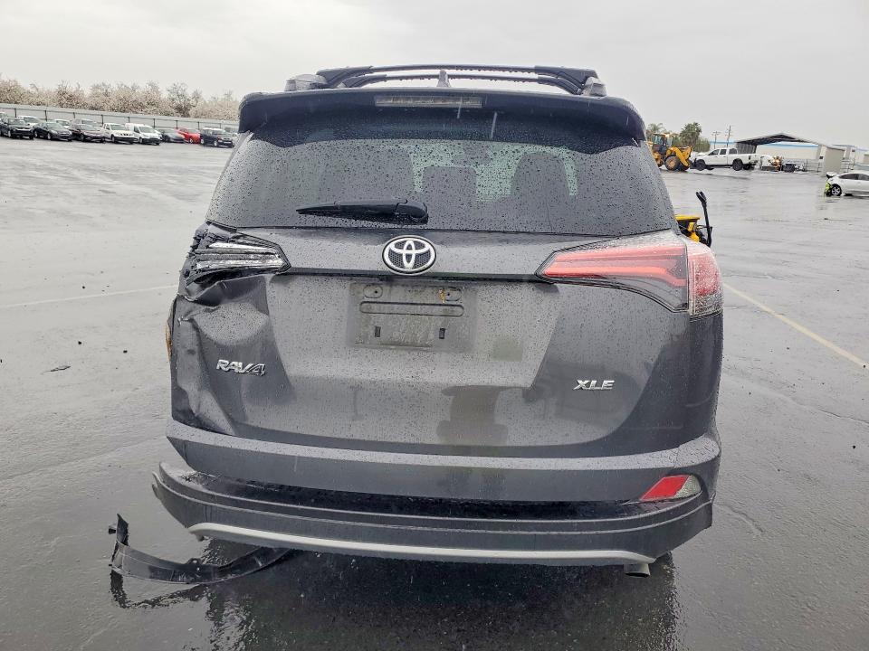Photo 6 from auction – 2018 TOYOTA RAV4 with VIN 2T3WFREV0JW506250