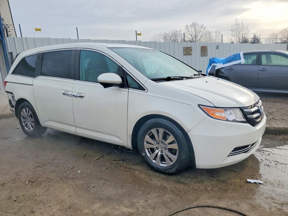 Photo 4 from auction – 2016 HONDA ODYSSEY with VIN 5FNRL5H65GB160553