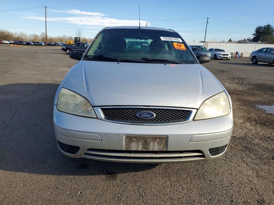 Photo 5 from auction – 2007 FORD FOCUS with VIN 1FAFP31N87W214023