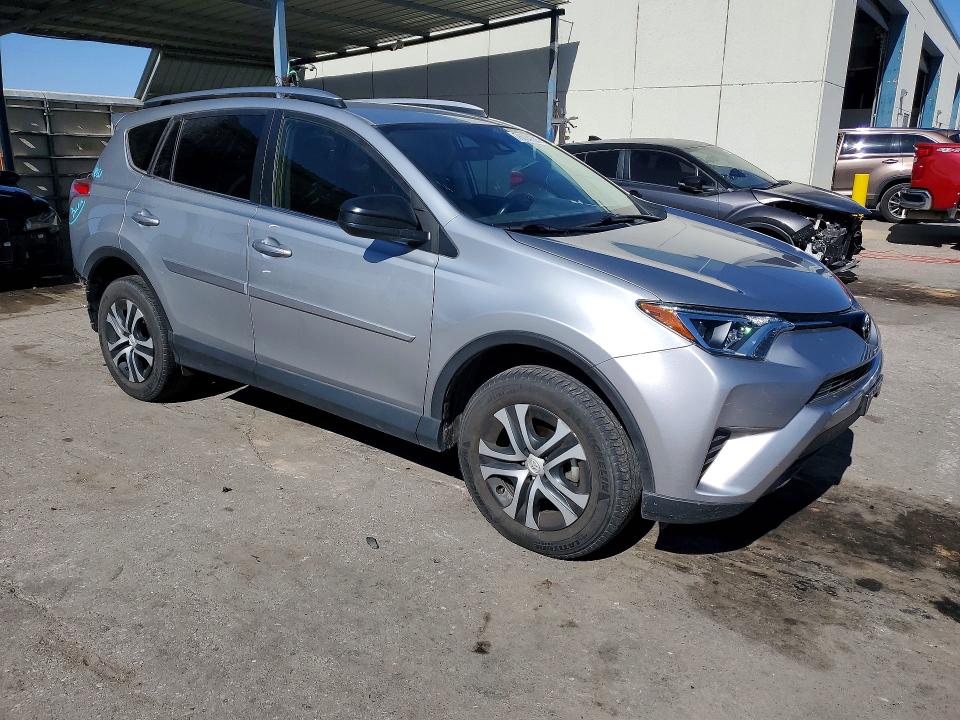 Photo 4 from auction – 2018 TOYOTA RAV4 LE with VIN JTMBFREV3JJ236802