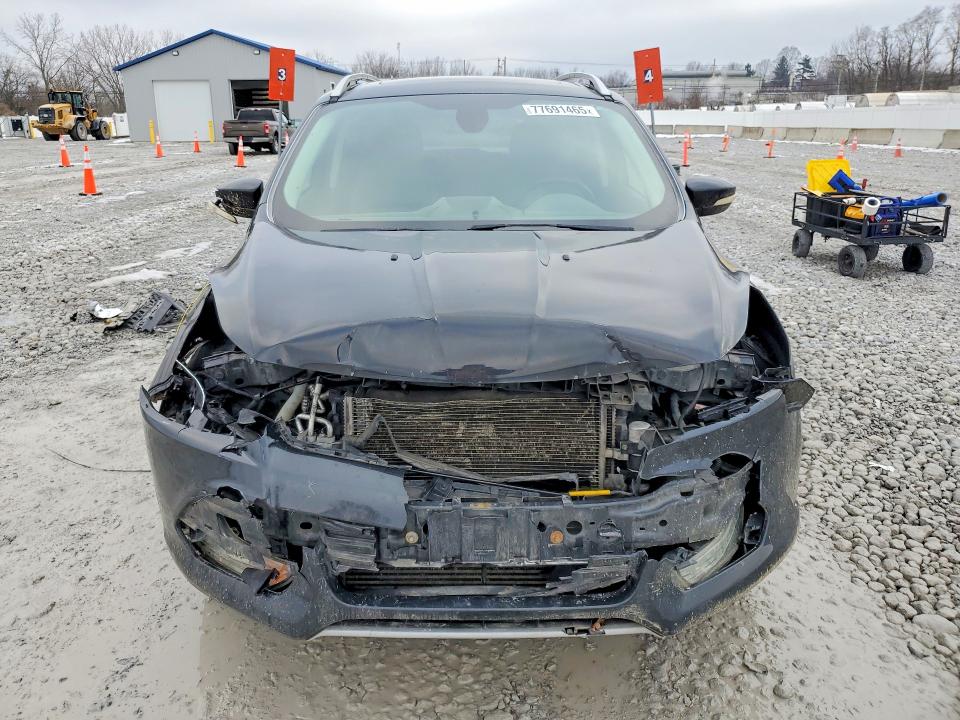 Photo 5 from auction – 2015 FORD ESCAPE with VIN 1FMCU9J97FUA05499