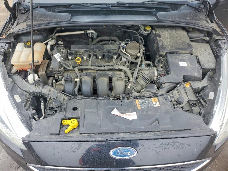 Photo 11 from auction – 2015 FORD FOCUS with VIN 1FADP3F29FL276519