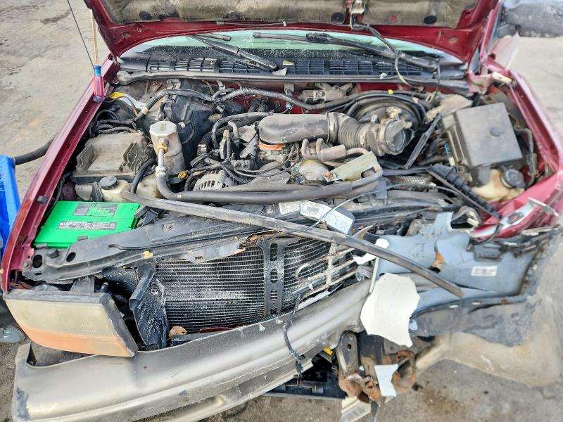 Photo 12 from auction – 2001 GMC JIMMY SLE with VIN 1GKDT13W312200038