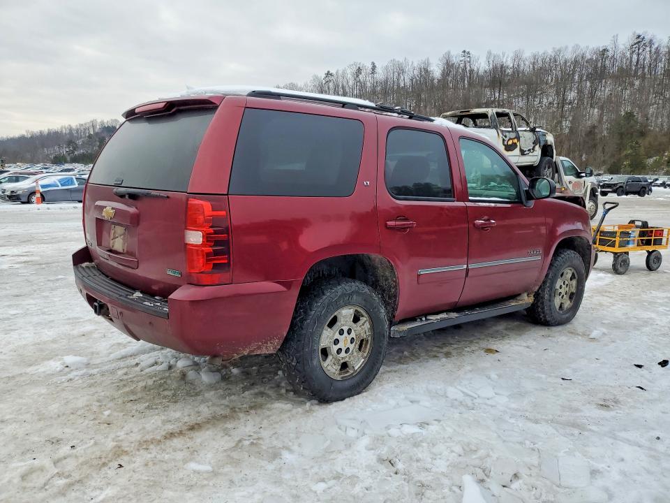 Photo 3 from auction – 2011 CHEVROLET TAHOE with VIN 1GNSKBE02BR302838