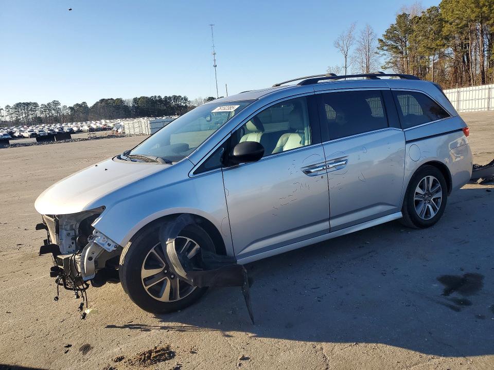 HONDA ODYSSEY 2014 with VIN 5FNRL5H94EB094357 - Photo from auction