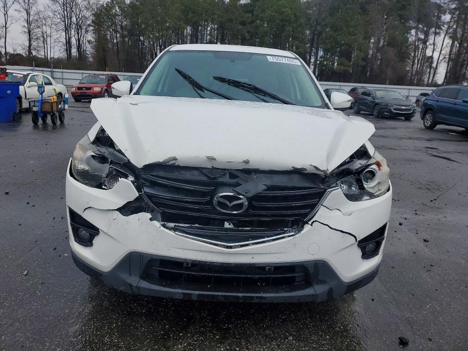 Photo 5 from auction – 2016 MAZDA CX-5 TOURI with VIN JM3KE2CY0G0609954