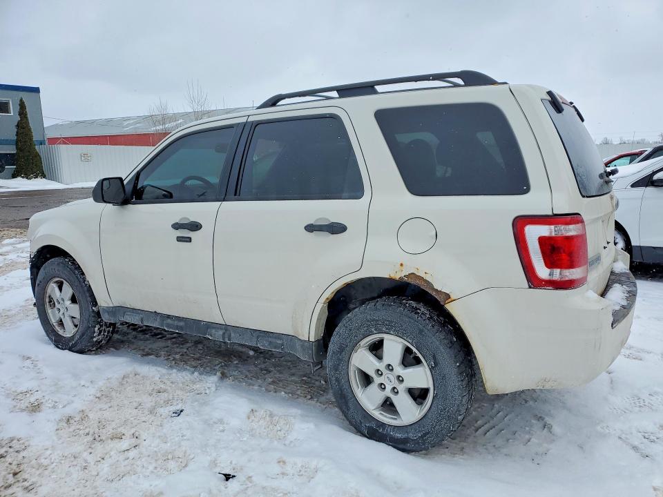 Photo 2 from auction – 2011 FORD ESCAPE with VIN 1FMCU0D75BKA77619