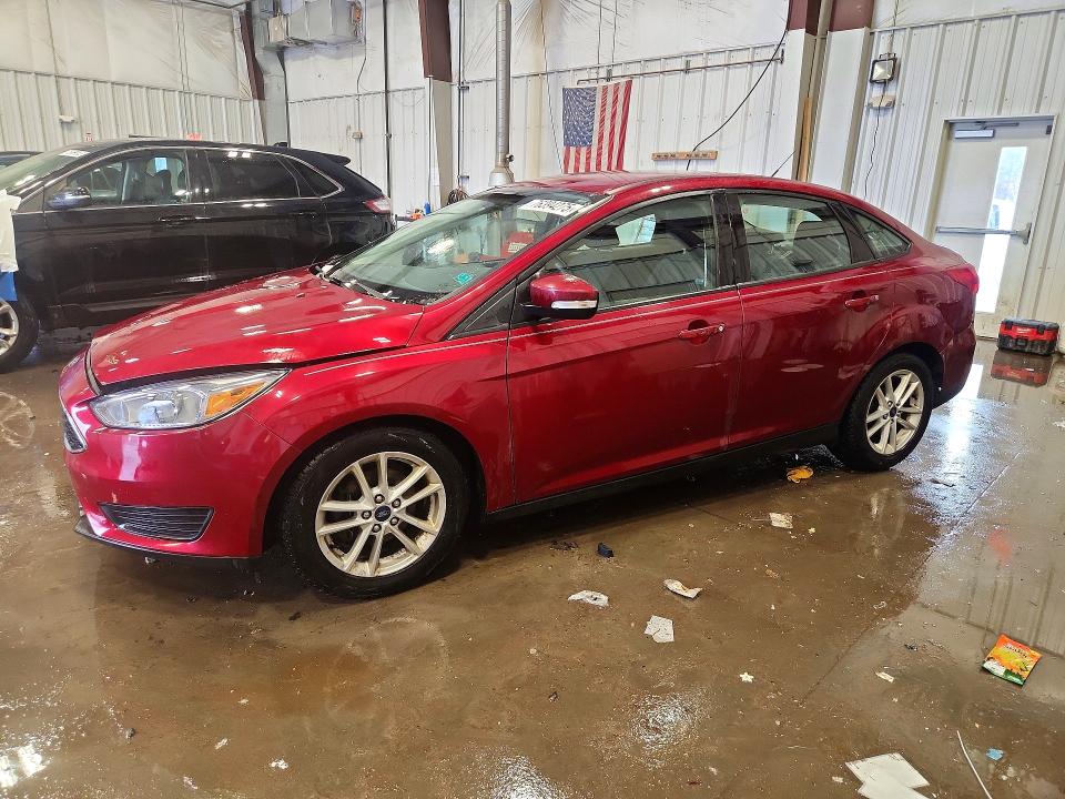 FORD FOCUS 2016 with VIN 1FADP3F29GL357716 - Photo from auction