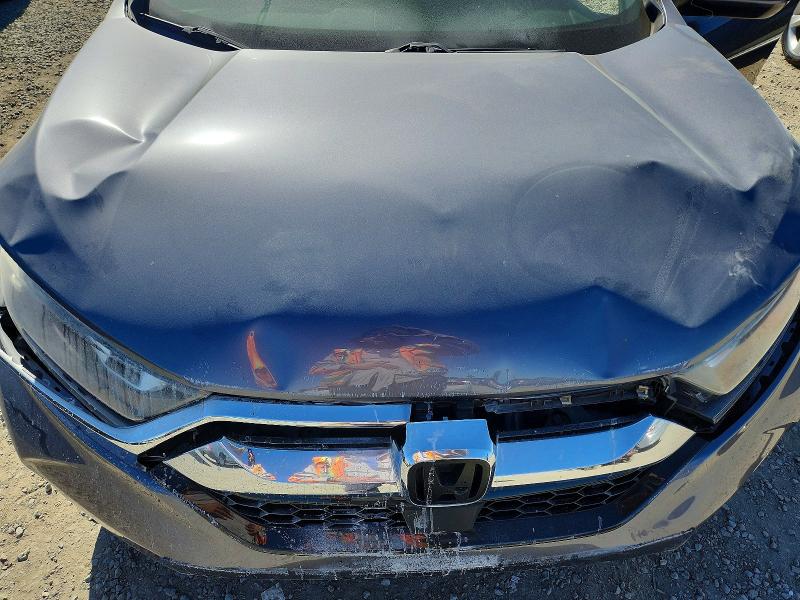 Photo 12 from auction – 2019 HONDA CR-V with VIN JHLRW2H80KX013128