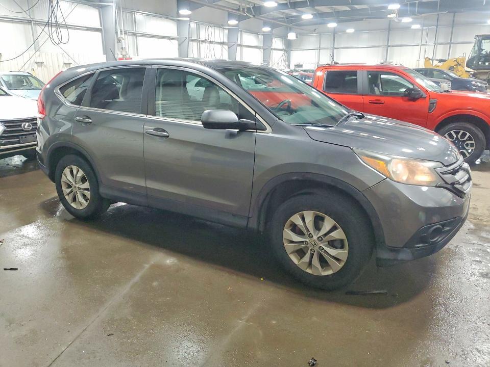 Photo 4 from auction – 2014 HONDA CR-V with VIN 5J6RM4H50EL069158