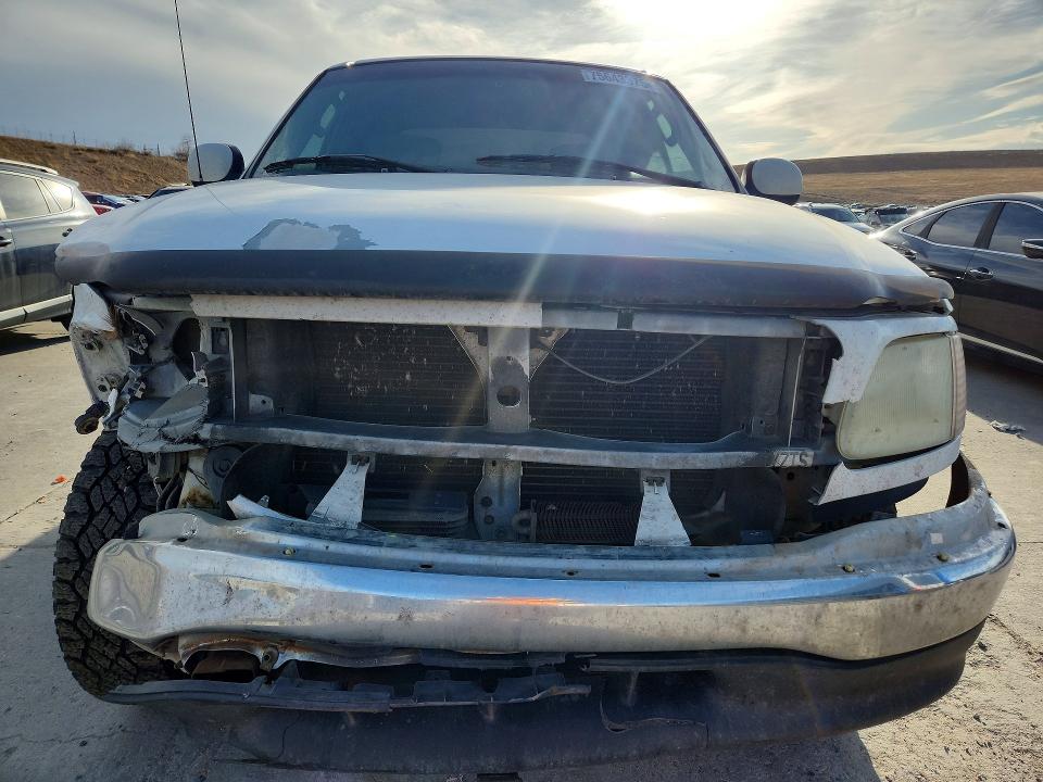 Photo 5 from auction – 2003 FORD F150 SUPER with VIN 1FTRW08L73KD80077