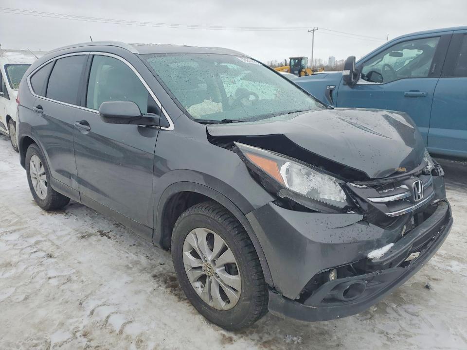 Photo 4 from auction – 2014 HONDA CR-V EXL with VIN 2HKRM4H79EH607173