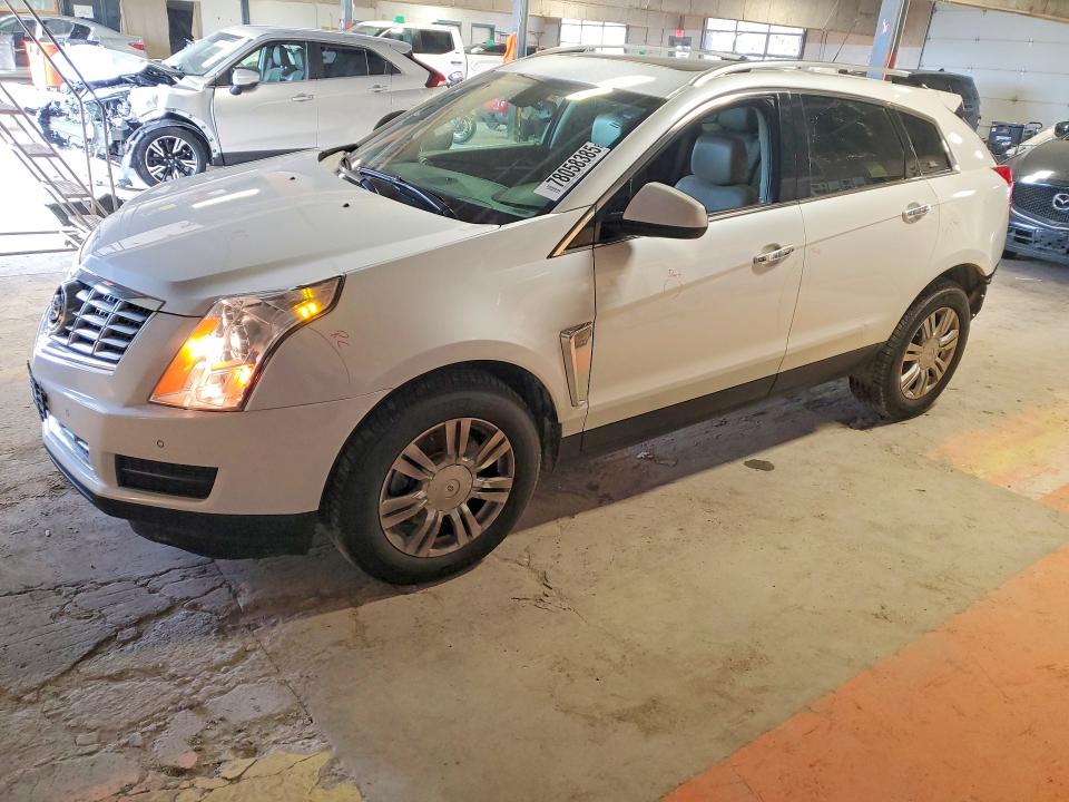 CADILLAC SRX 2015 with VIN 3GYFNBE38FS567174 - Photo from auction