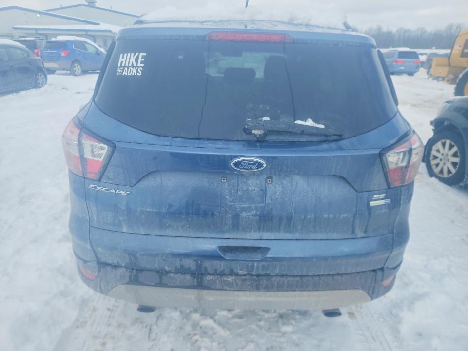 Photo 6 from auction – 2018 FORD ESCAPE with VIN 1FMCU9GD9JUB69213