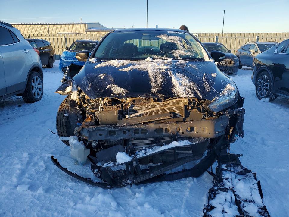 Photo 5 from auction – 2018 FORD FOCUS with VIN 1FADP3FE0JL306302