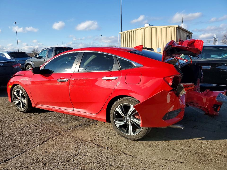 Photo 2 from auction – 2017 HONDA CIVIC with VIN 2HGFC1F91HH640823