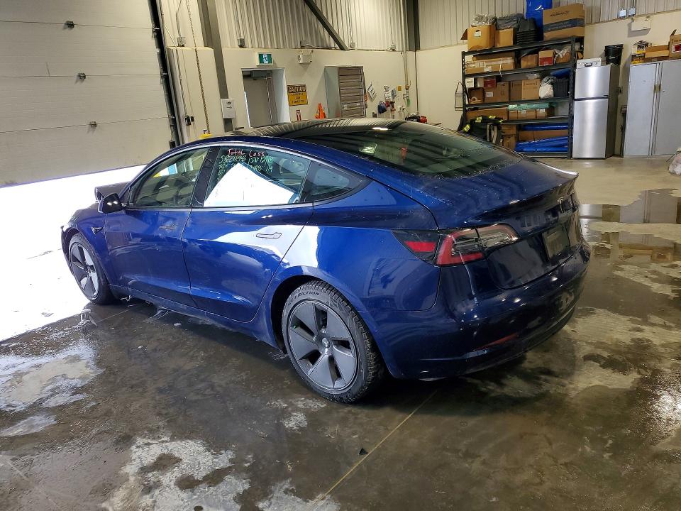 Photo 2 from auction – 2022 TESLA MODEL 3 with VIN 5YJ3E1EAXNF308906