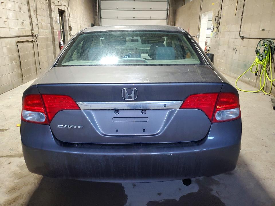Photo 6 from auction – 2010 HONDA CIVIC with VIN 19XFA1F55AE063040