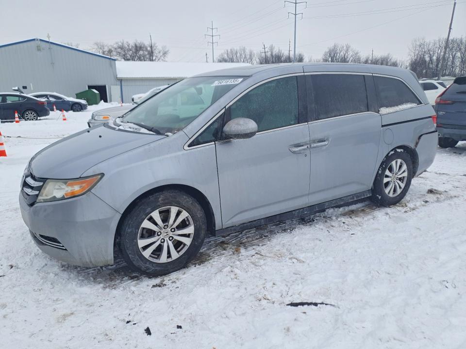 HONDA ODYSSEY 2016 with VIN 5FNRL5H63GB082385 - Photo from auction