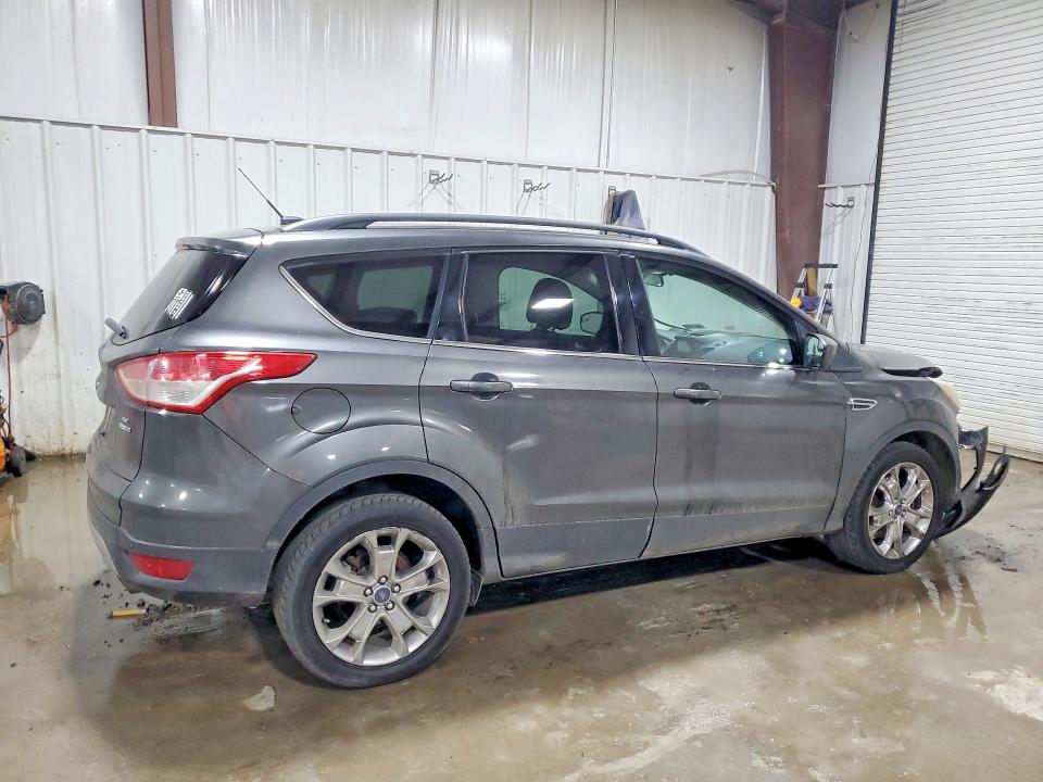 Photo 3 from auction – 2016 FORD ESCAPE with VIN 1FMCU9GX5GUA01264