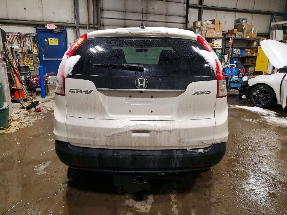 Photo 6 from auction – 2013 HONDA CR-V EXL with VIN 2HKRM4H79DH104368