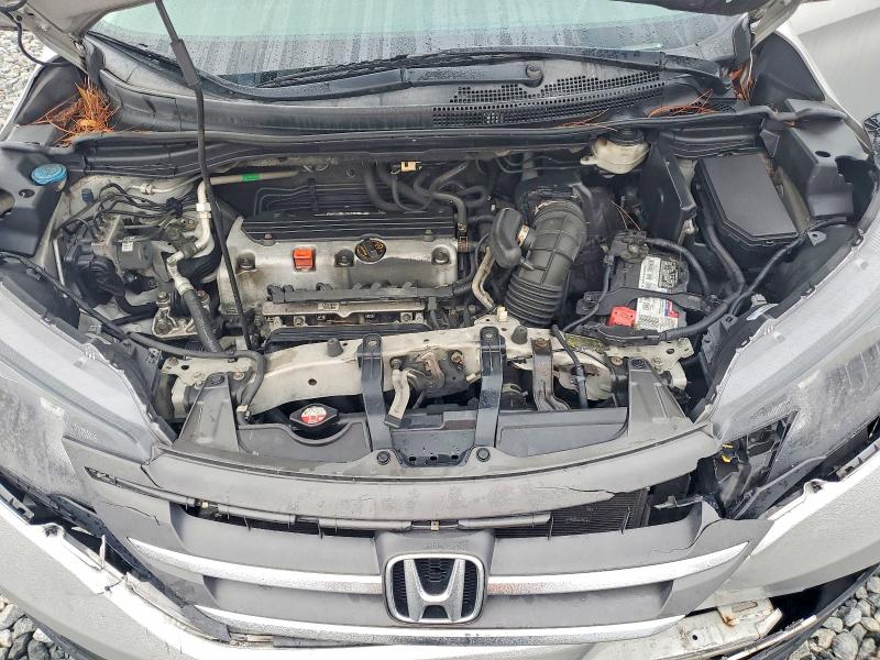 Photo 12 from auction – 2012 HONDA CR-V with VIN 2HKRM3H34CH512718