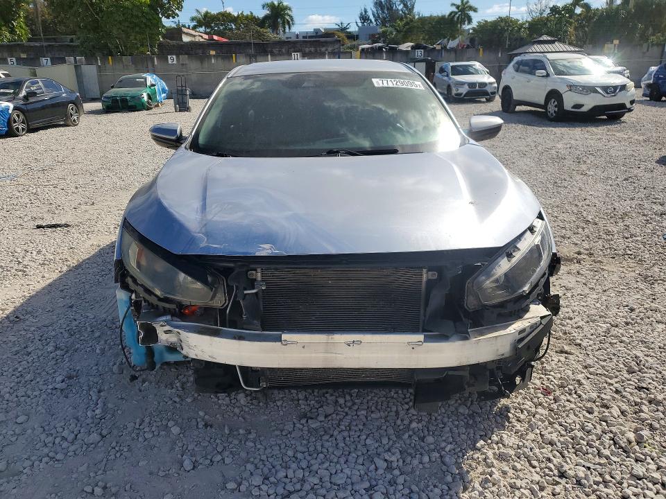 Photo 5 from auction – 2020 HONDA CIVIC SPOR with VIN 19XFC2F80LE007844