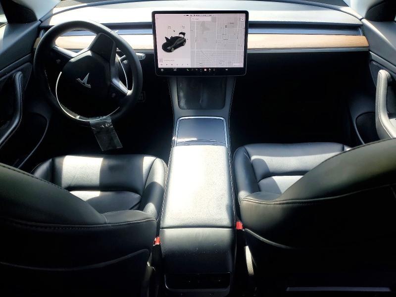 Photo 8 from auction – 2021 TESLA MODEL 3 with VIN 5YJ3E1EB2MF871259