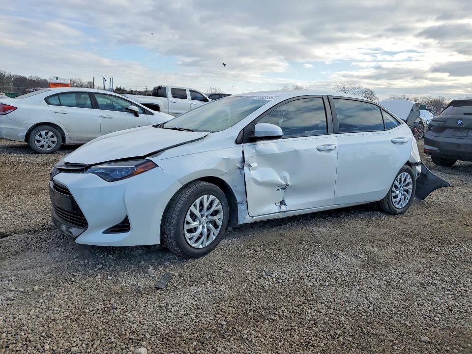 TOYOTA COROLLA 2018 with VIN 5YFBURHE6JP786993 - Photo from auction