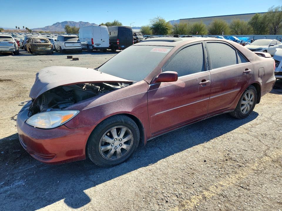 TOYOTA CAMRY LE 2002 with VIN 4T1BF32K82U027428 - Photo from auction