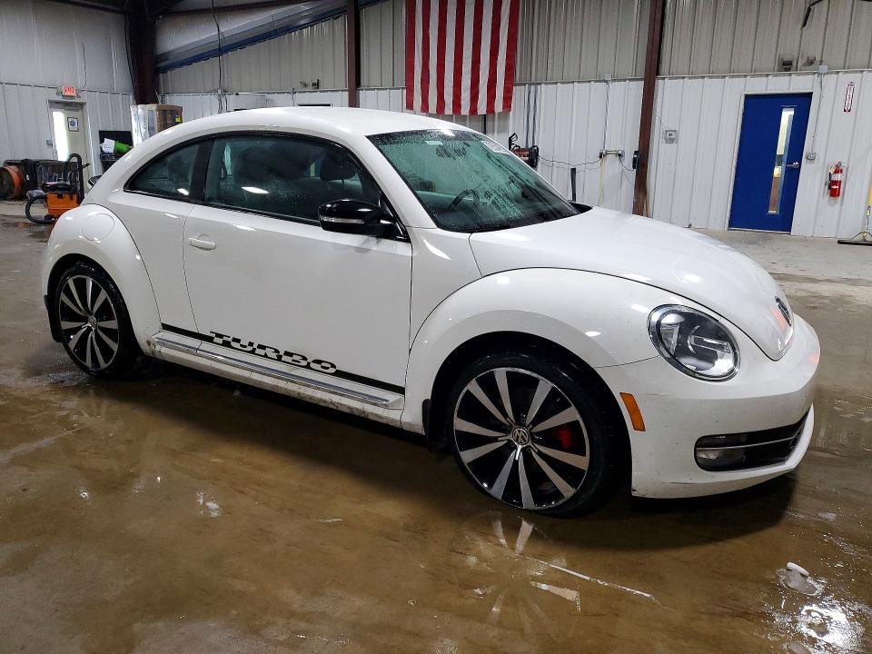 Photo 4 from auction – 2012 VOLKSWAGEN BEETLE TUR with VIN 3VWVA7AT9CM604116