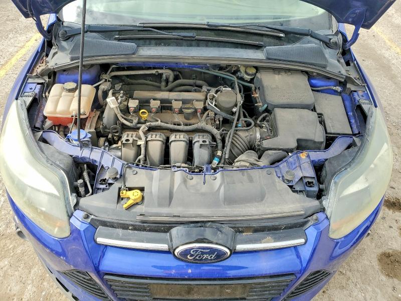 Photo 11 from auction – 2014 FORD FOCUS with VIN 1FADP3K25EL253999