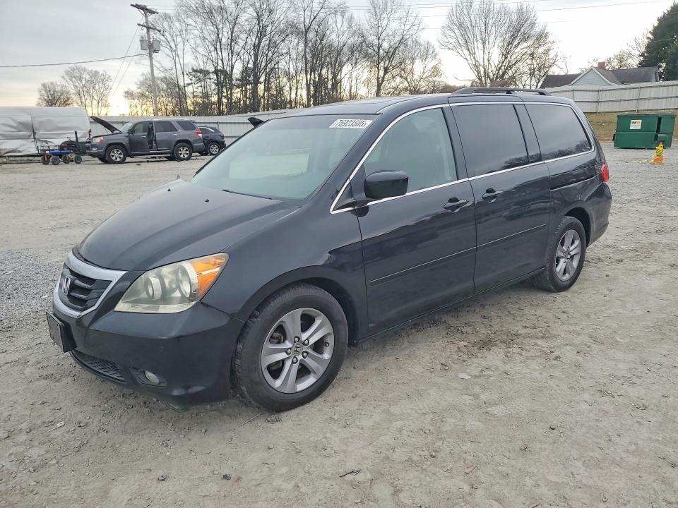HONDA ODYSSEY 2009 with VIN 5FNRL38939B059965 - Photo from auction