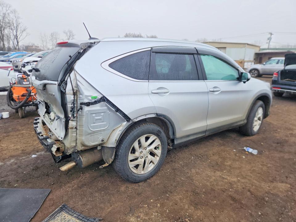 Photo 3 from auction – 2016 HONDA CR-V with VIN 2HKRM4H77GH600466