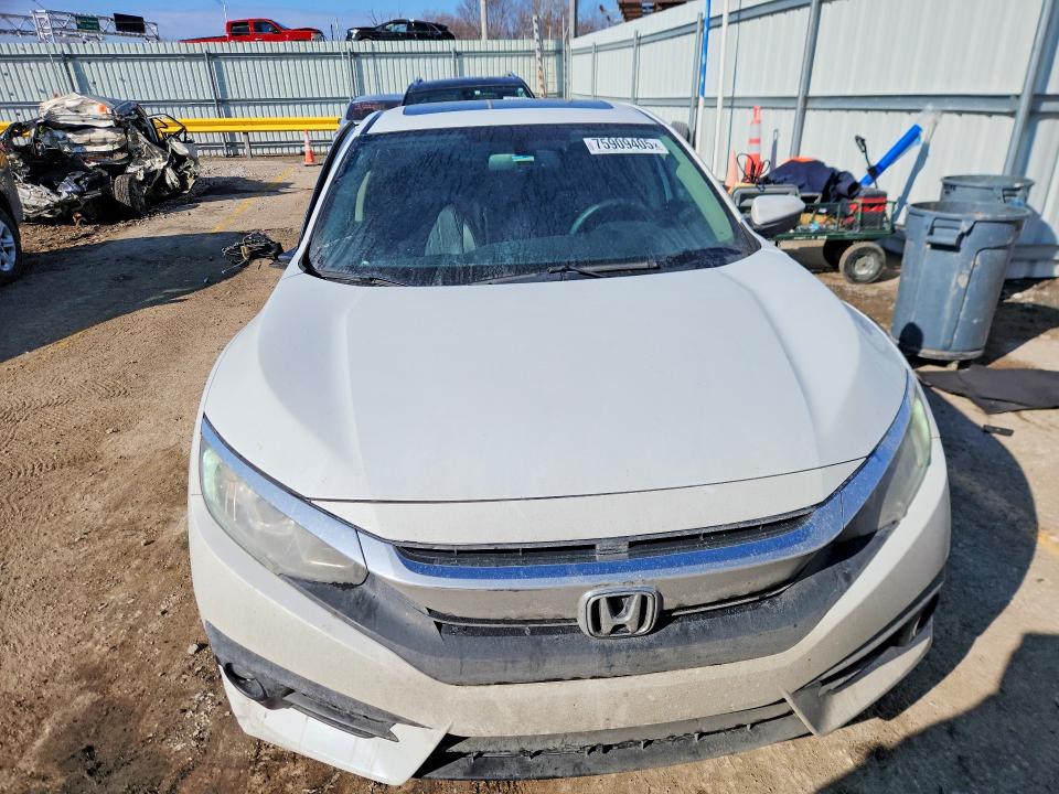 Photo 5 from auction – 2018 HONDA CIVIC with VIN 2HGFC1F70JH643409