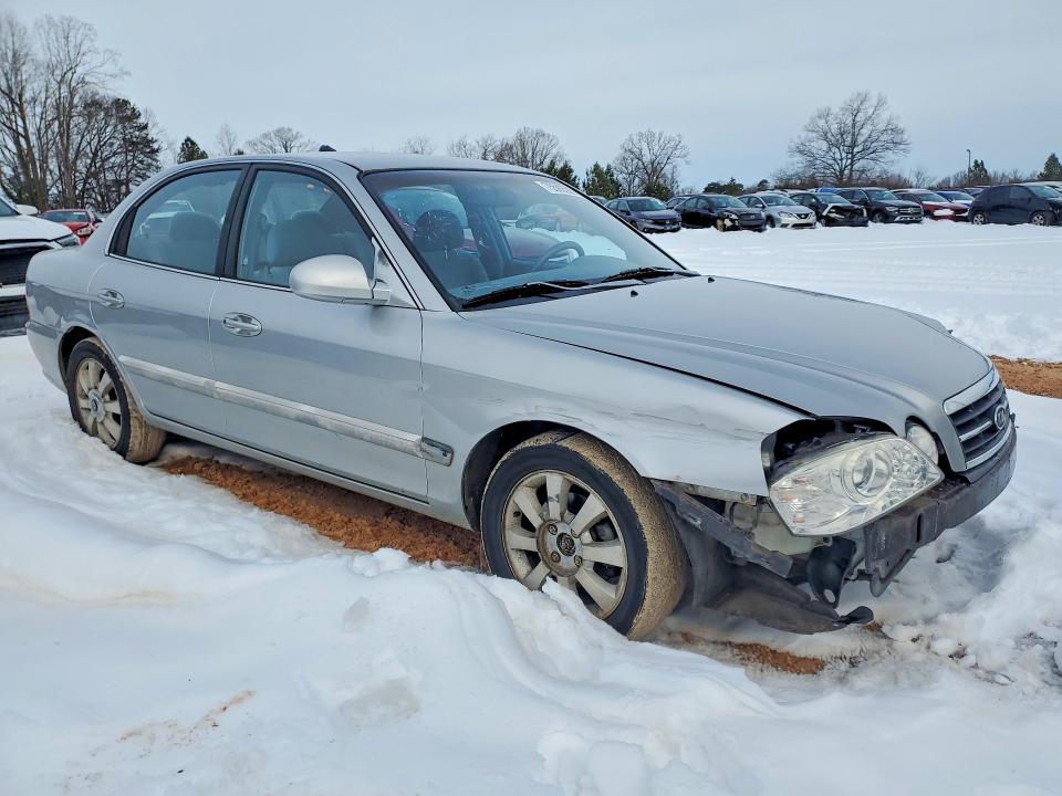 Photo 4 from auction – 2005 KIA OPTIMA LX with VIN KNAGD128555428679