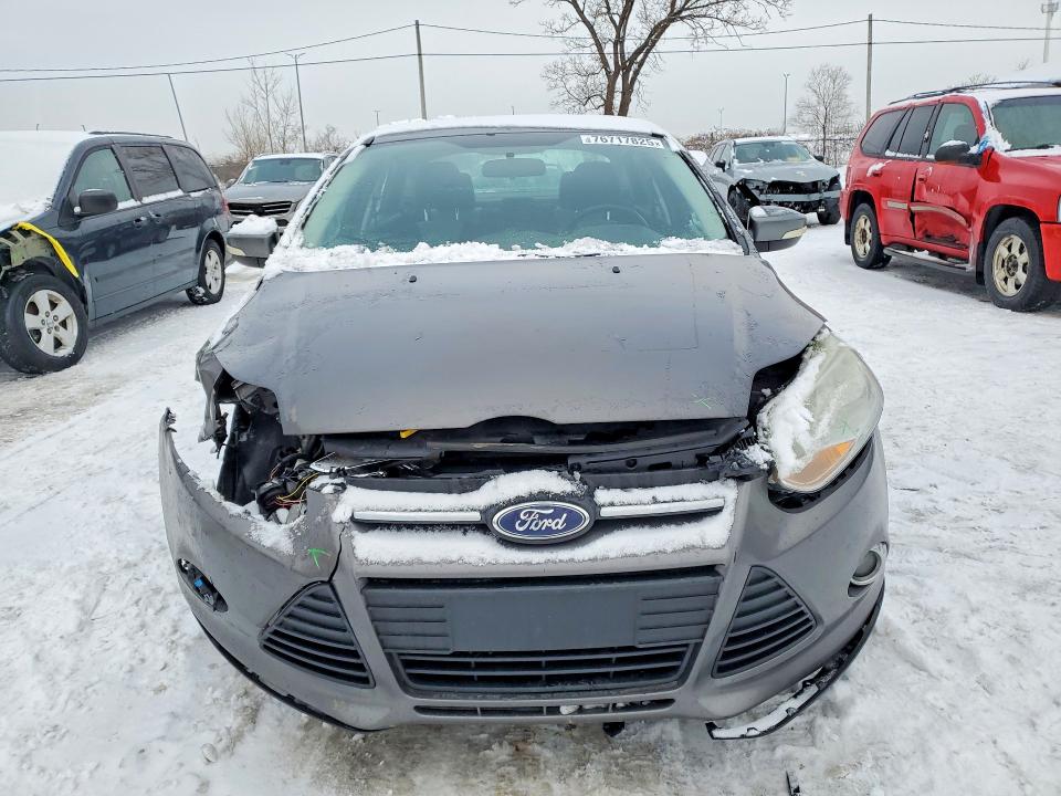 Photo 5 from auction – 2013 FORD FOCUS SE with VIN 1FADP3F24DL310539