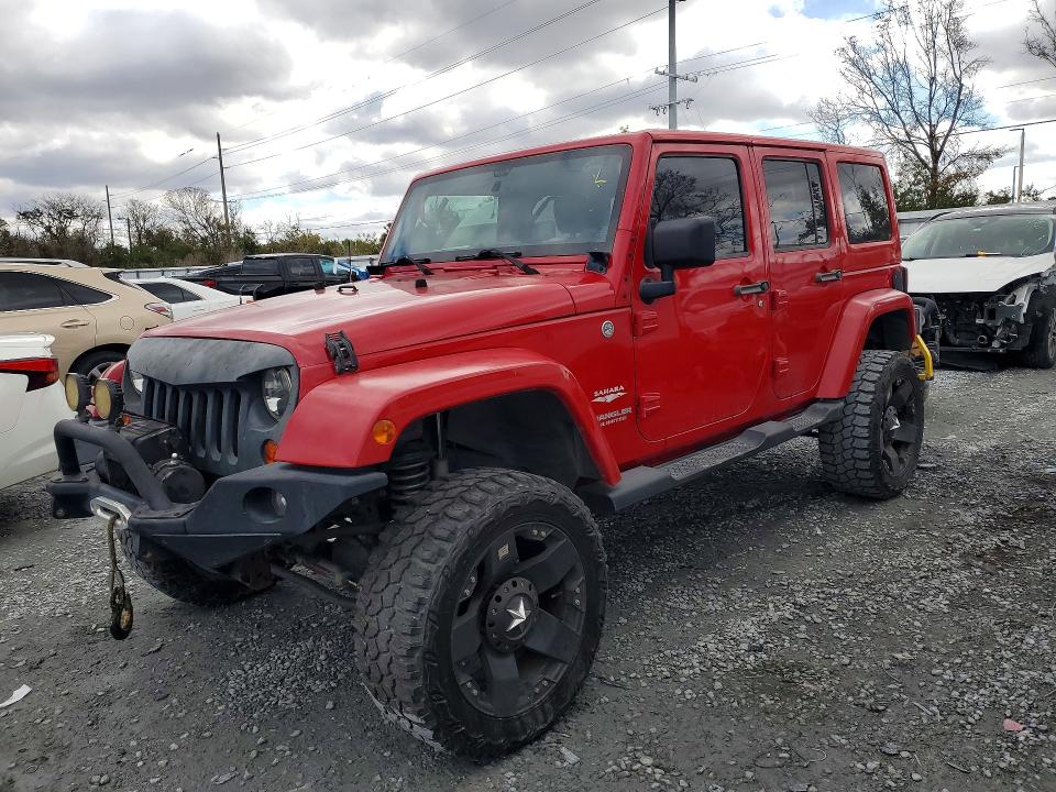 JEEP WRANGLER U 2011 with VIN 1J4BA5H14BL507415 - Photo from auction