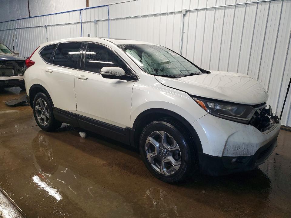 Photo 4 from auction – 2017 HONDA CR-V with VIN 2HKRW2H84HH605228