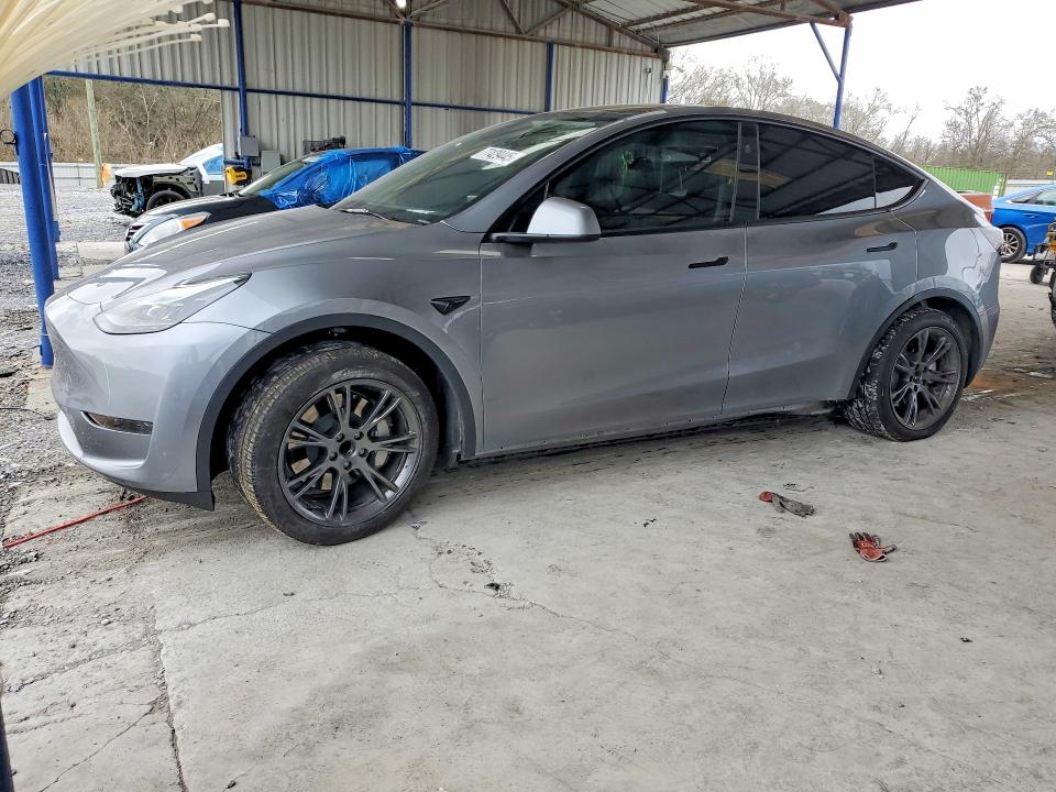 TESLA MODEL Y 2024 with VIN 7SAYGDED5RA332516 - Photo from auction