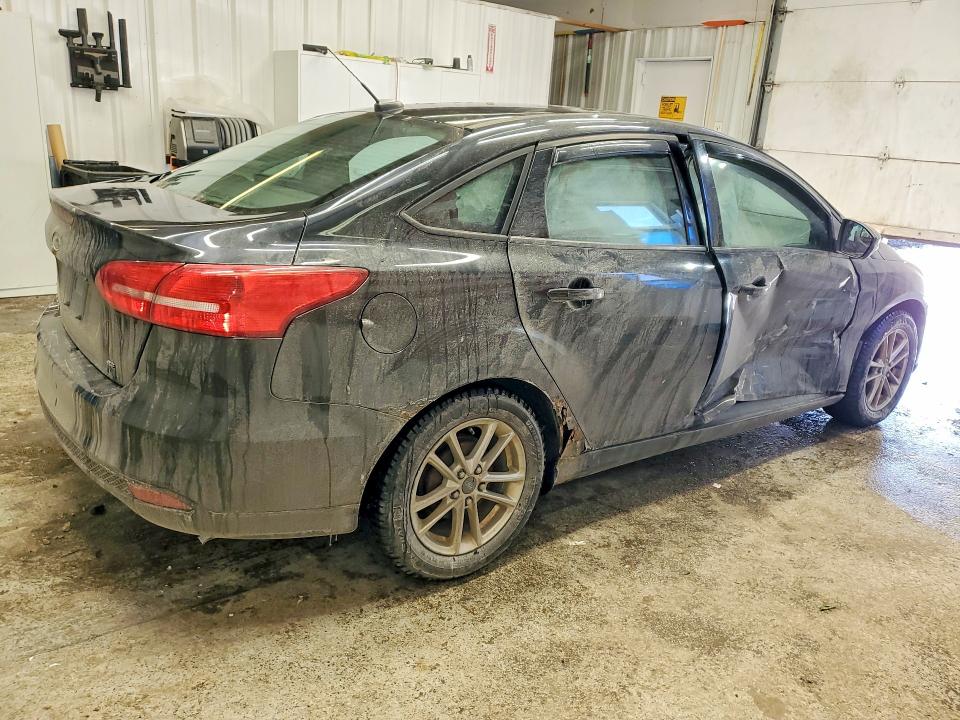 Photo 3 from auction – 2015 FORD FOCUS with VIN 1FADP3F25FL352964