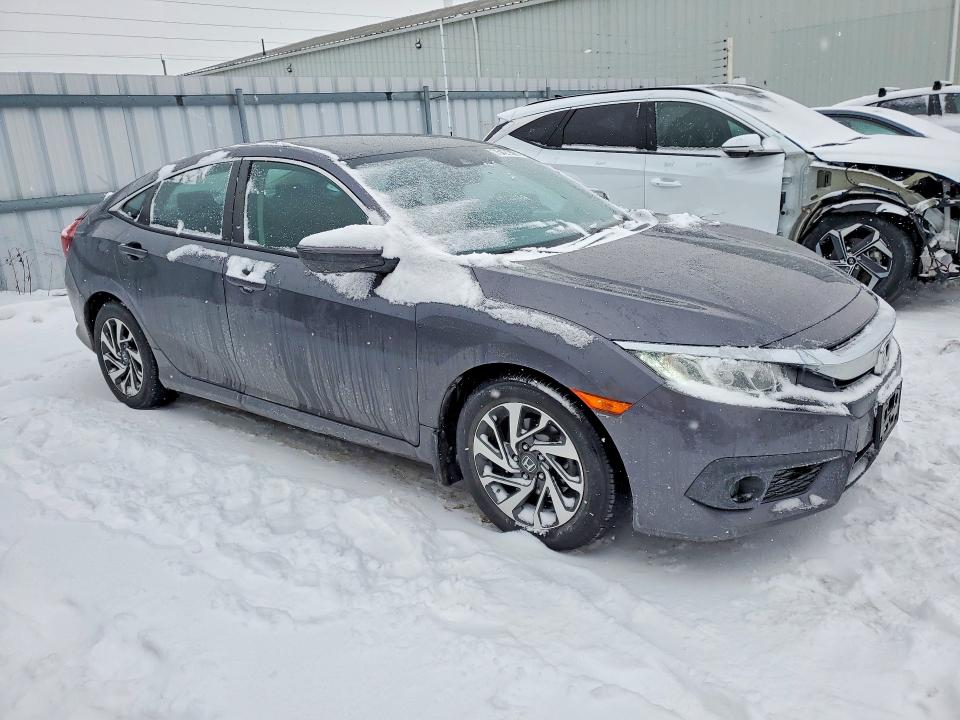 Photo 4 from auction – 2018 HONDA CIVIC with VIN 2HGFC2F63JH031850