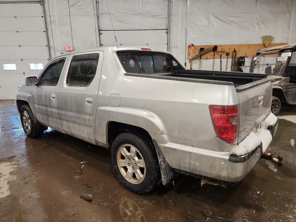 Photo 2 from auction – 2011 HONDA RIDGELINE with VIN 5FPYK1F43BB451321