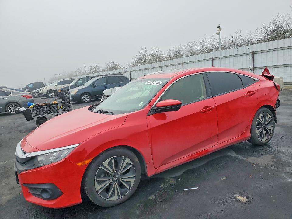 HONDA CIVIC 2018 with VIN JHMFC1F31JX014506 - Photo from auction